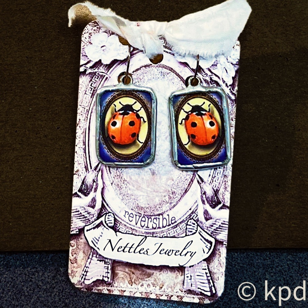 NWT pair of NETTLES REVERSIBLE hand made Lady Bug earrings